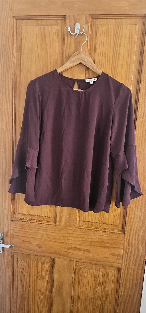  — plum blouse - warehouse