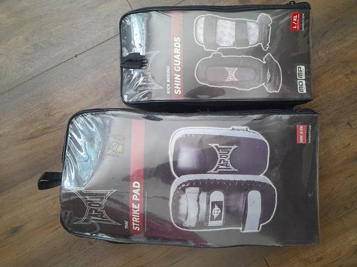  — strike pad and shin guard