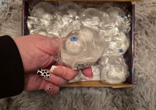  — new 12pk Squeezy Eyeballs