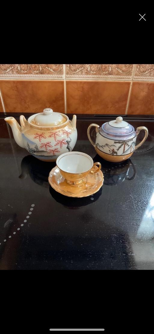  — T-pot ,sugar bowl and cup & saucer