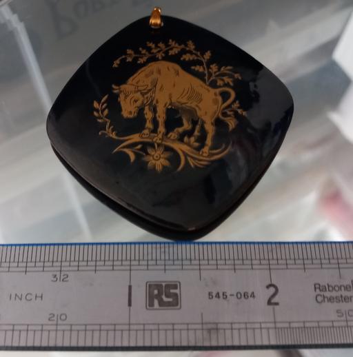  — Enamelled golden Taurus Bull pendant