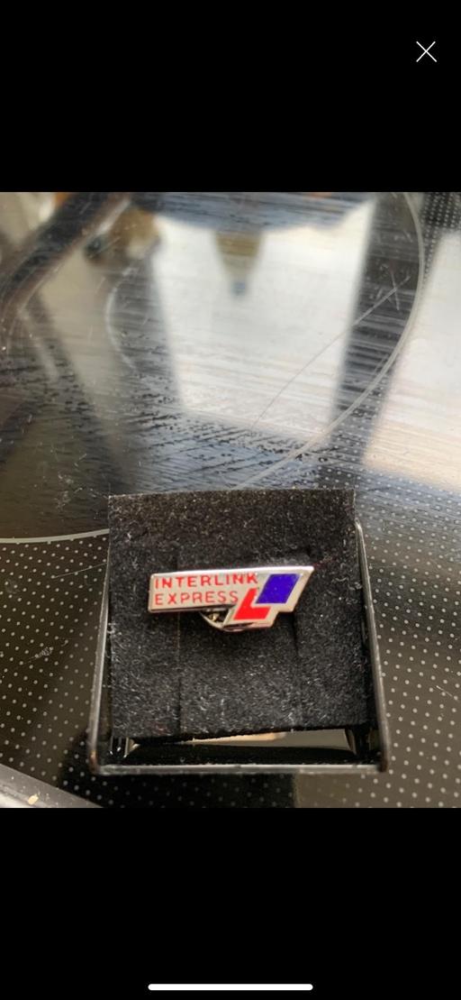  — Metal badge