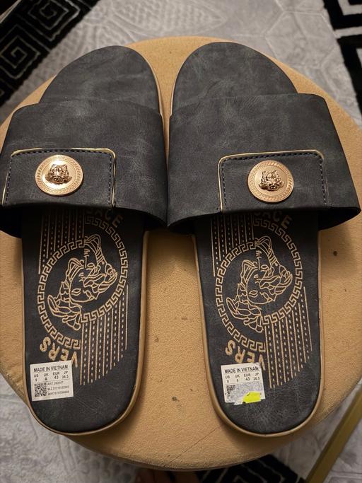  — Versace slides