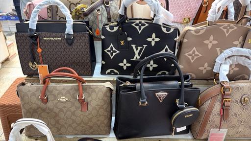  — Exquisite ladies, designer bags