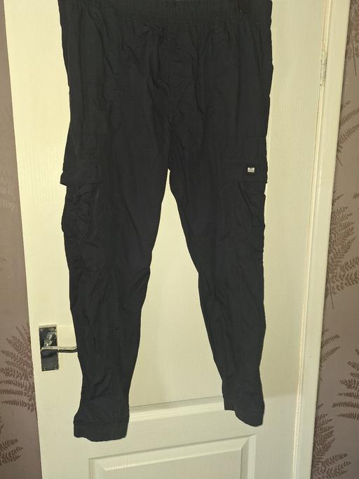  — Weekend Offender navy cargo trousers
