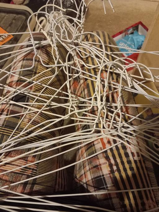  — 16 metal hangers