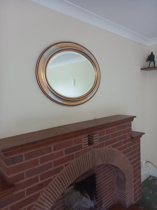  — oval mirror