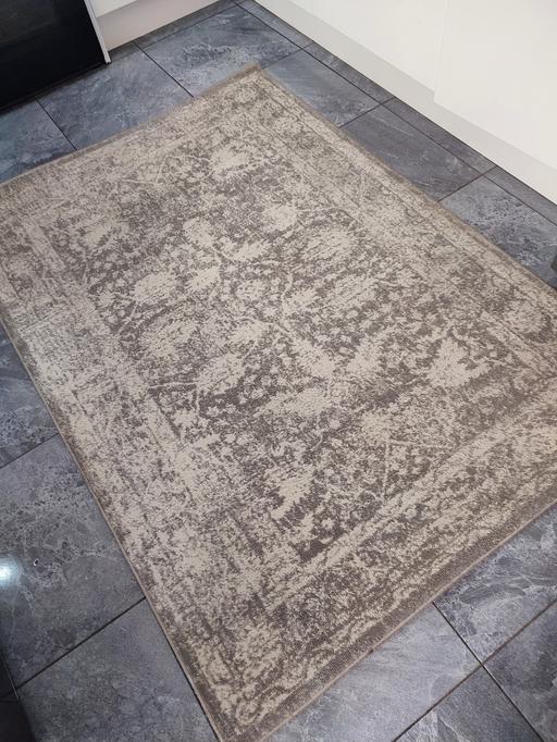 — gray rug