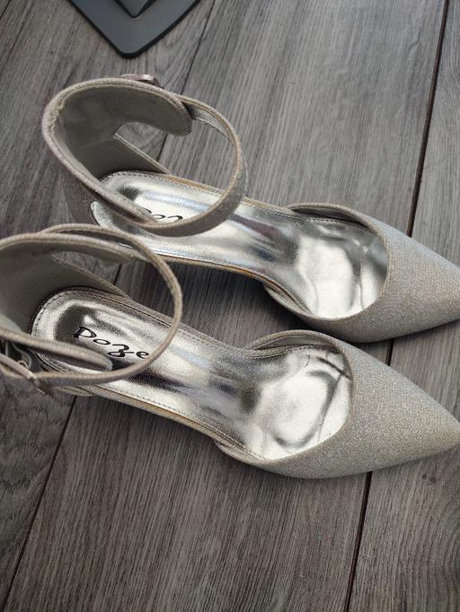  — silver shoes