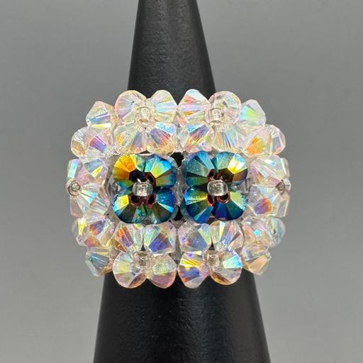  — Crystal Ring