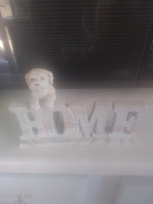  — HOME DOG STATUE