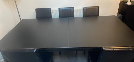  — Wooden Dinnertable extendable with 6 chairs