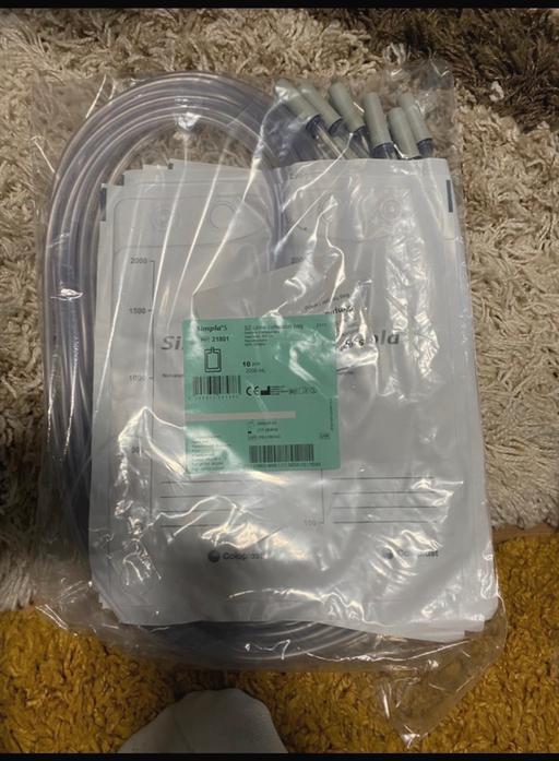  — Urine collection bags and 6 hand sanitizer