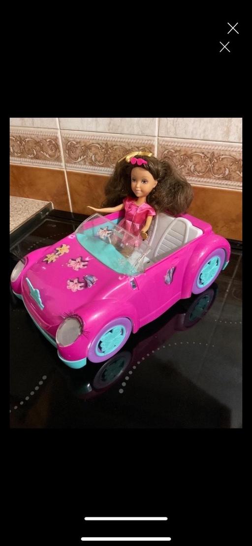  — Barbie type doll and car