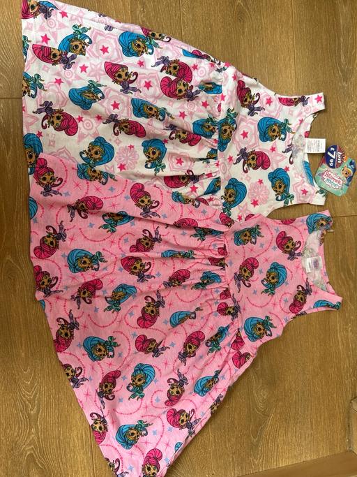  — Twin pack baby dresses. Age 12-18 or 18-24 m.