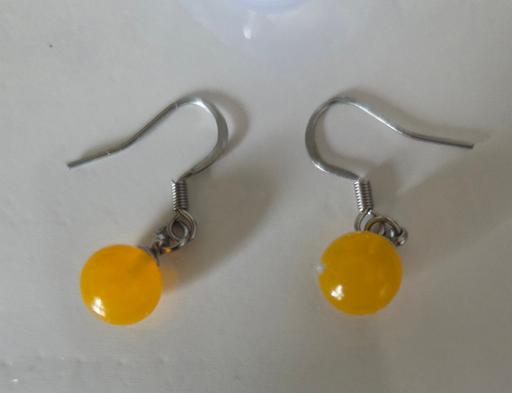 — EARRINGS