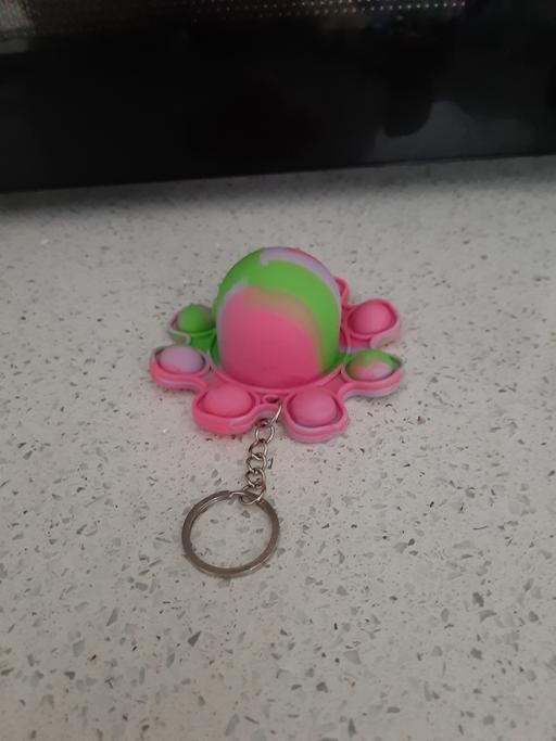  — fidget keyring
