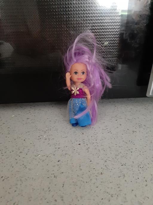  — doll
