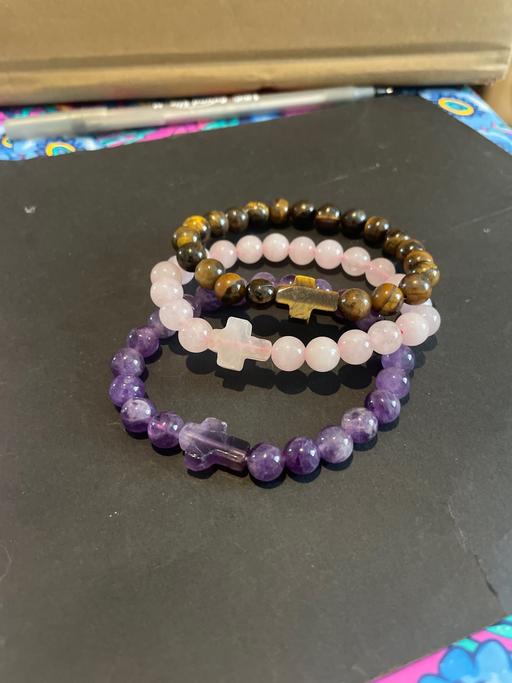  — Crystal cross charm bead bracelet set.