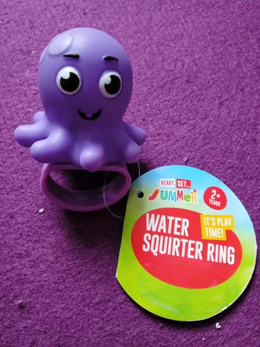  — brand new kids WATER SQUIRTER RING