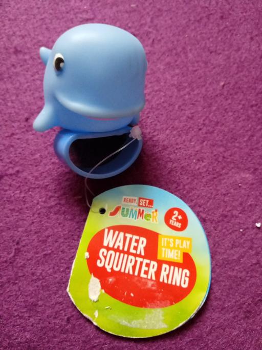  — brand new kids WATER SQUIRTER RING