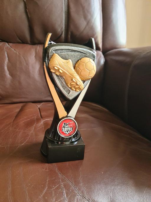  — 7 x football trophies 