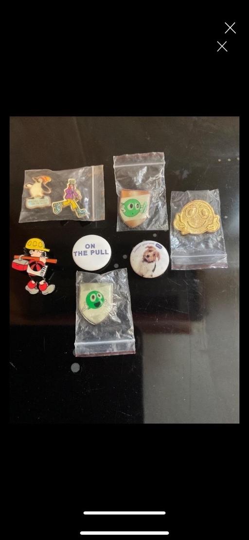  — Collection of badges
