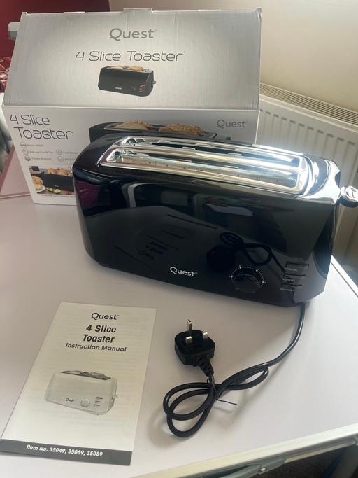  — Quest 4 Slice Toaster