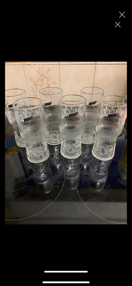  — Carling larger glass’s
