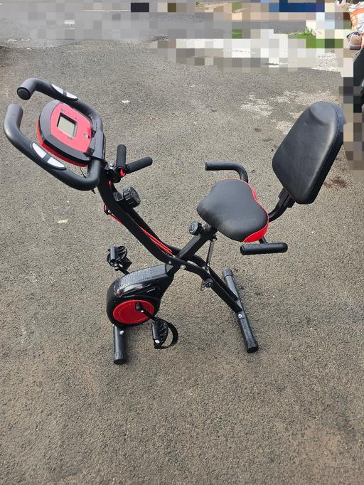  — exercise bike foldable with back rest and res