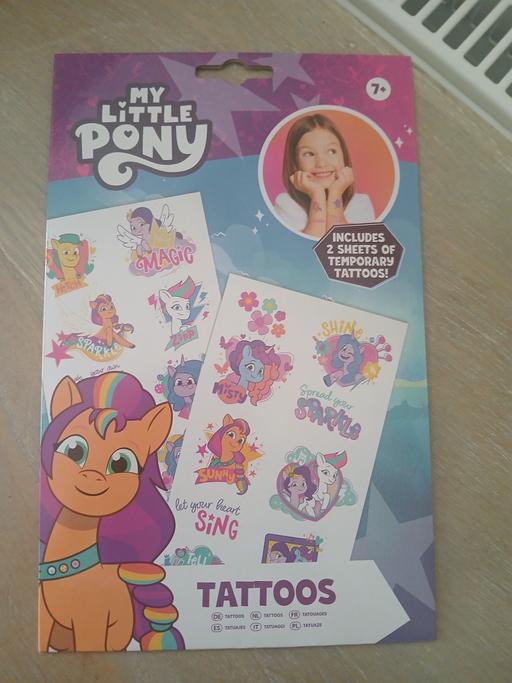  — tattoos)