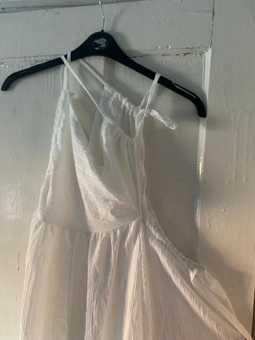  — Dress