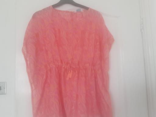  — girls age 11-12 beach cover-up