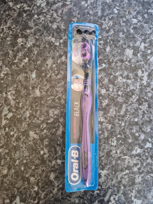  — brand new toothbrush