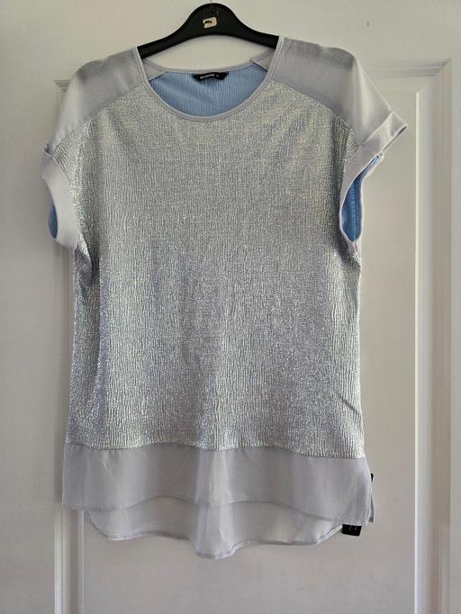  — Roman Originals shimmer front chiffon hem top