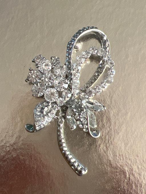  — Loveky brooch
