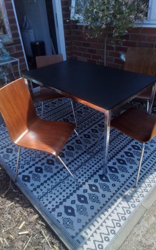  — STYLISH TABLE AND CHAIRS