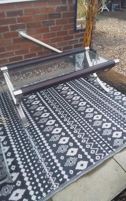  — QUALITY COFFEE TABLE