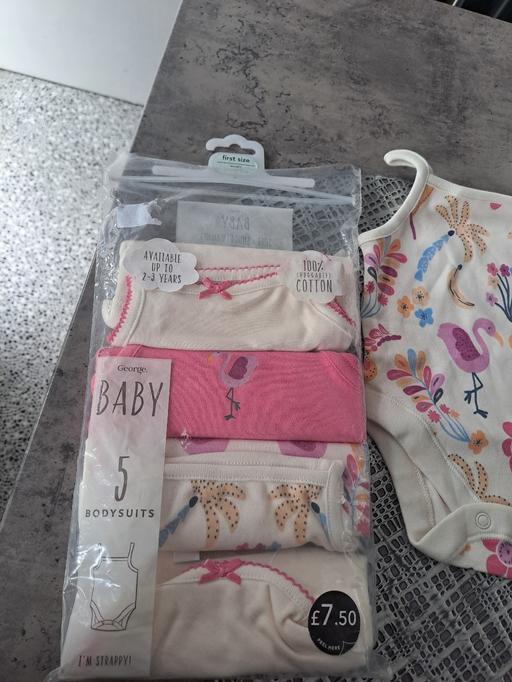  — new baby body suits
