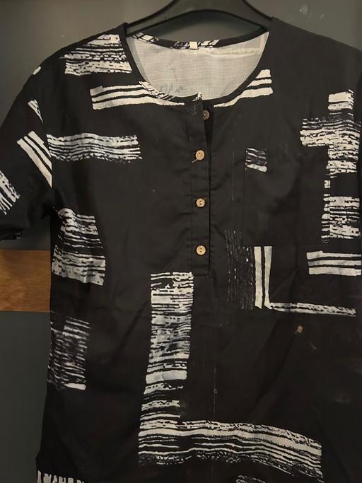  — Shirt