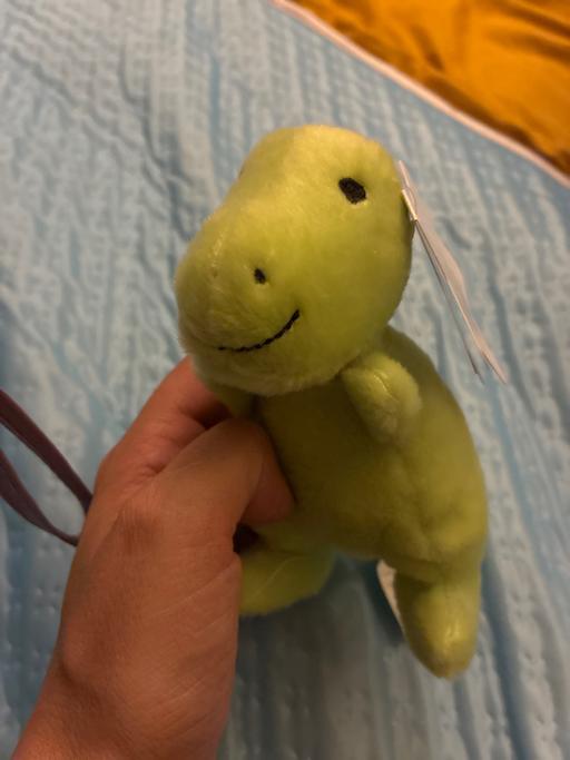  — Mini dinosaur plush