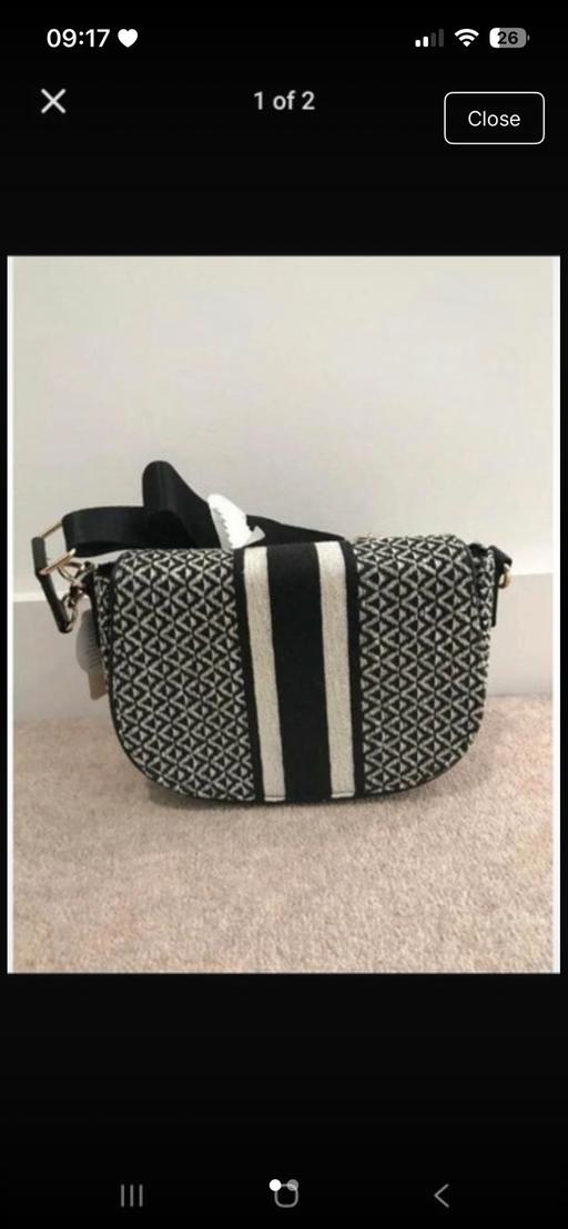  — Primary crossbody