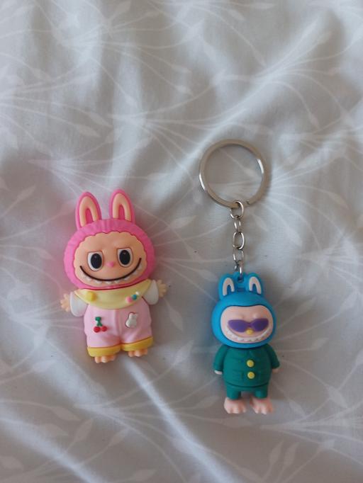  — key ring and small figure