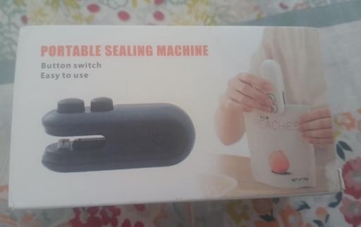  — Sealing machine)