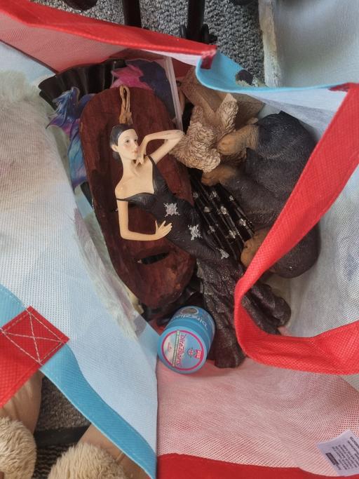 — bag with lady ornaments and nicnaks