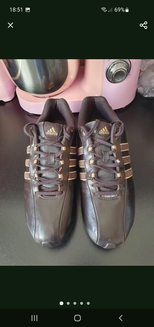  — men's brown Adidas trainers