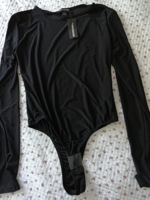  — ladies Bodysuit size *16* P. L. T