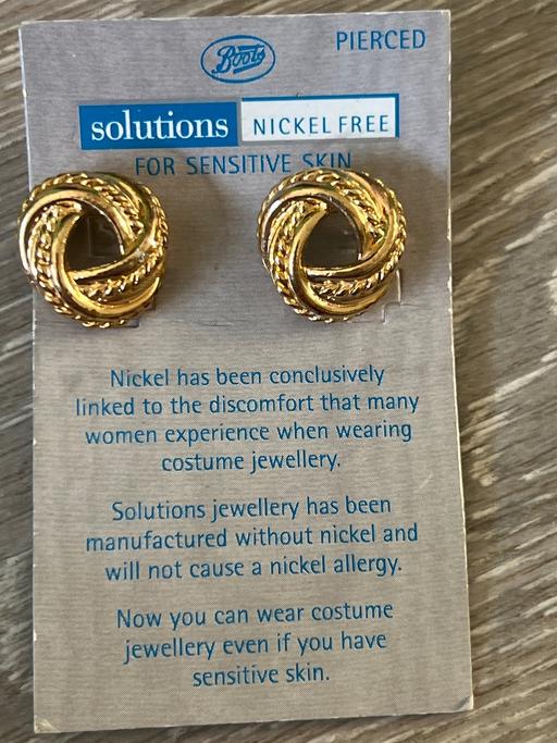  — Earrings