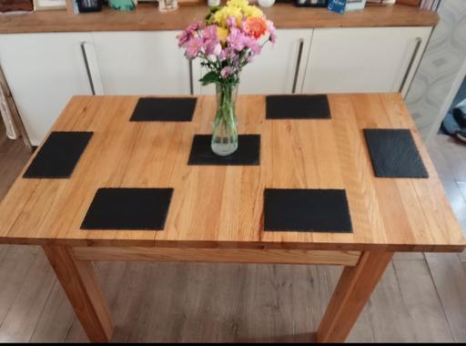  — solid oak extendable table