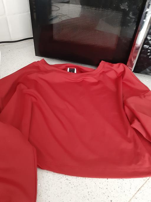 — new top ladies